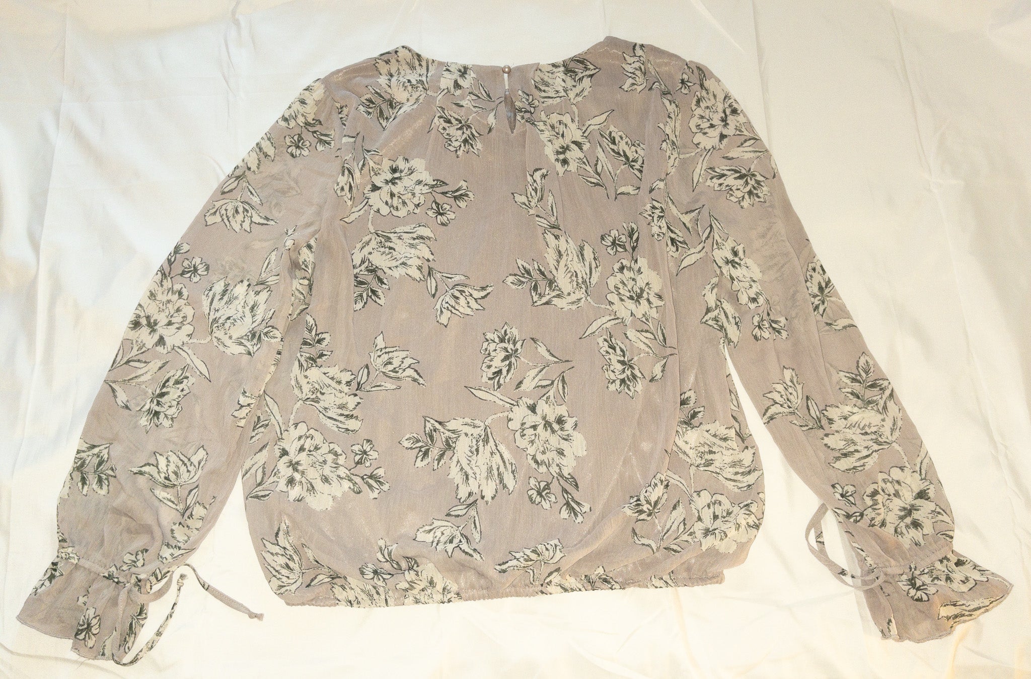 Blusa manga larga estampada marca Trovaré talla L