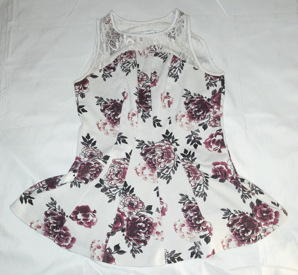 Polera sin mangas estampada marca Rickis talla XS