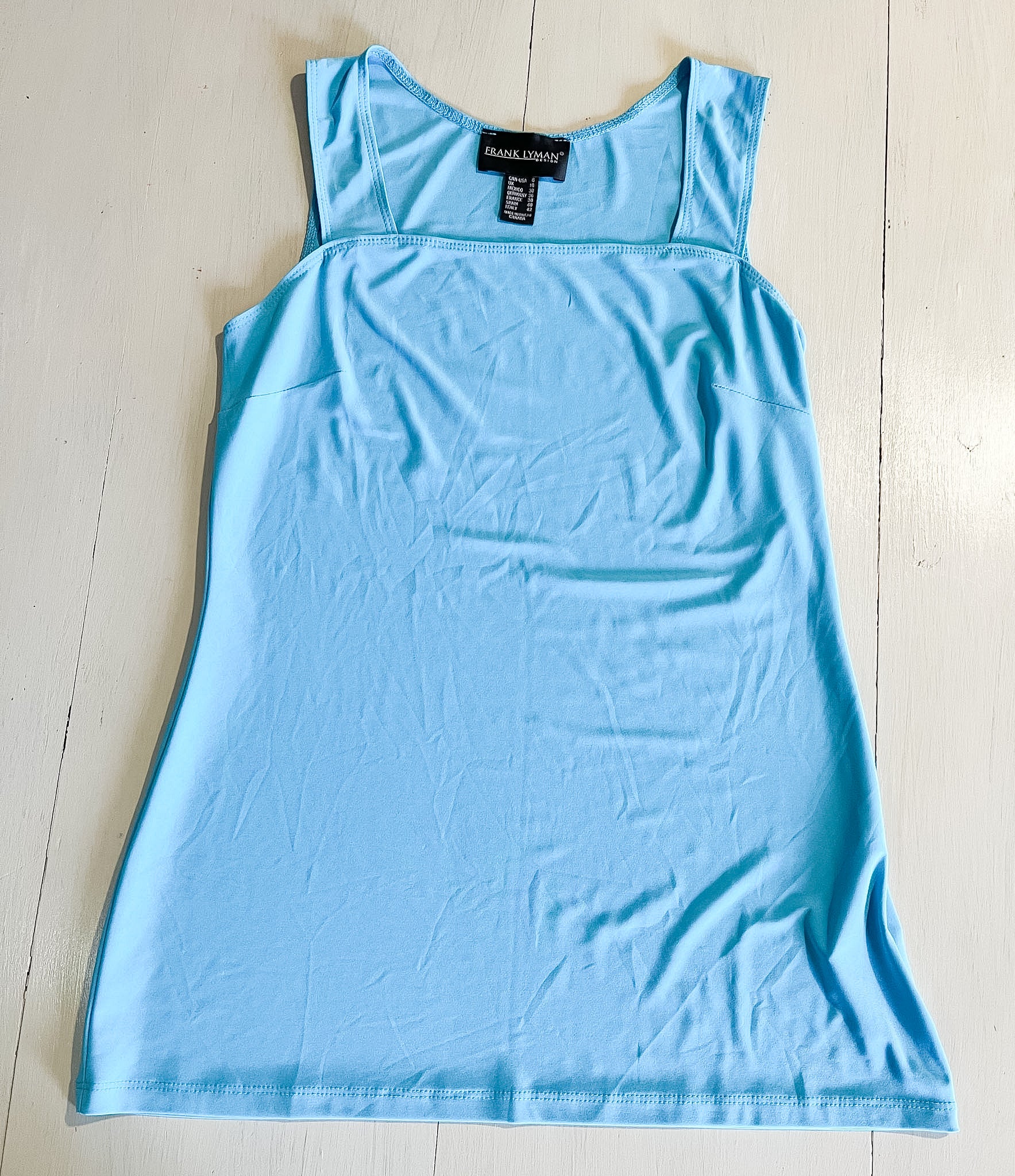 Polera marca Frank Lyman talla M